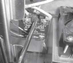 Using a Phillips head screwdriver, remove the screws securing the relay and remove relay from unit (Figure 2-16). Figure 2-15 10.