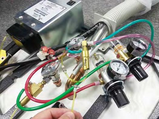 Connect the green wire of the adaptor harness to the USC base or electrical box to ground it.