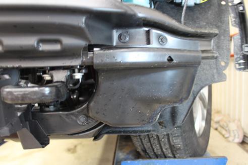 1. If equipped on your model of vehicle, the lower plastic shielding will need to be removed.