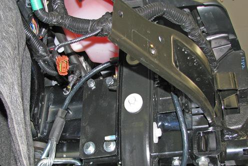 Flush the top of the plate with the frame. Tighten all hardware. Do this on both sides of the vehicle. 10.