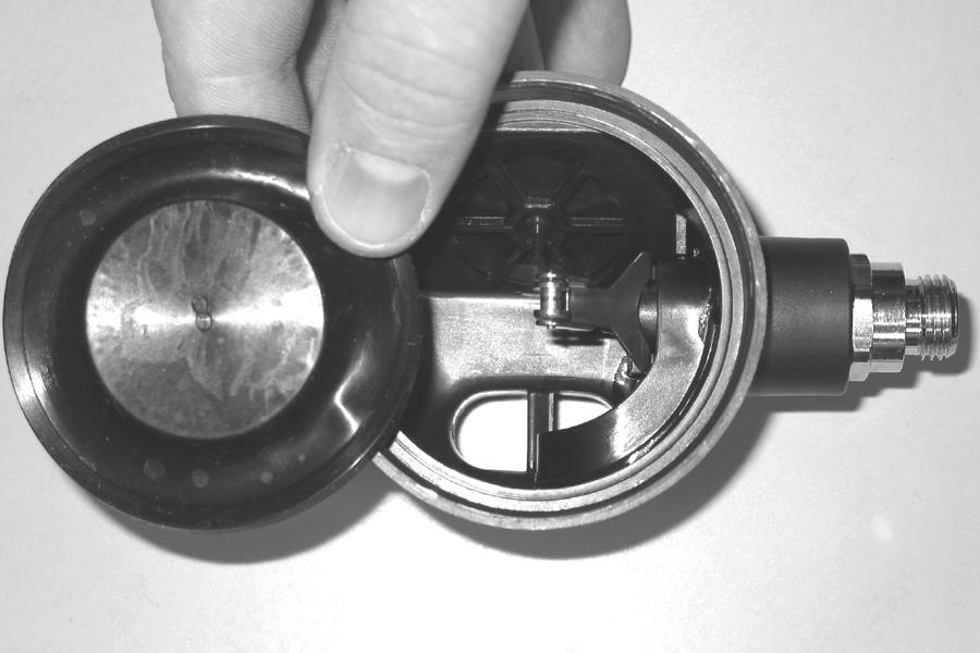 4" open end wrench. 3. Using a Universal Front Cover Tool, remove the COVER RING (17) to expose the FRONT COVER (16).