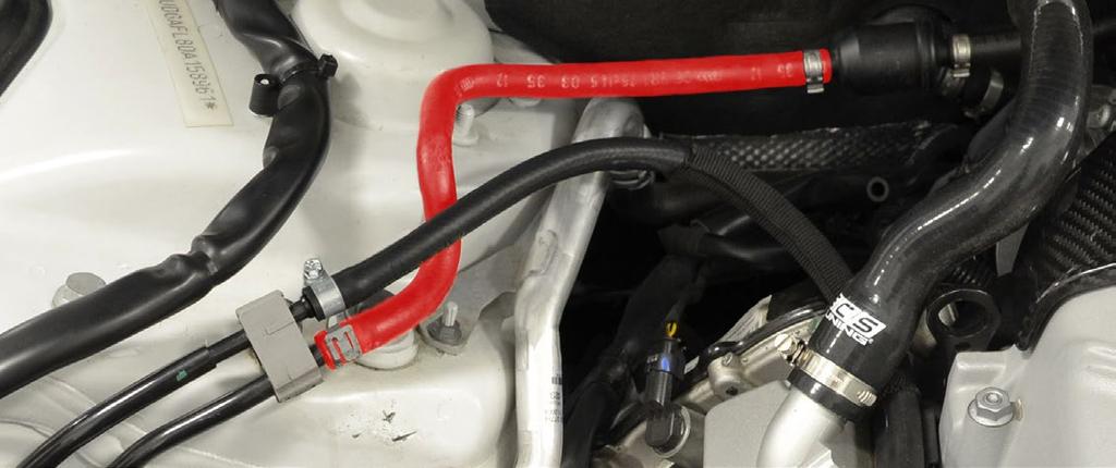 Section 1: Flipping the EVAP Hose Step #1 Step #2 Remove the intake tube. Note the location and orientation of the EVAP hose which has been highlighted in RED in Fig: 1.1. This hose will interfere with the new carbon fiber strut bar once installed.