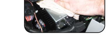Using the provided adhesive backed velcro place the large section of velcro onto the bottom of the amplifier.