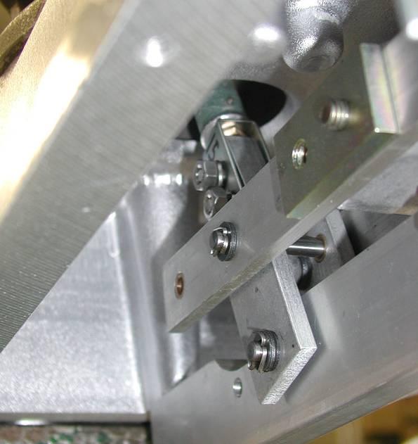 With switch mechanism closed, attach pull rod to the steel clevis link of the mechanism with ¼-20 x 1 stainless steel bolts, nuts, and lockwashers placed outside the pull rod side pieces.