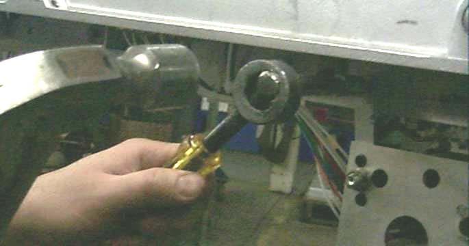 ) Install two power springs to the motor mechanism