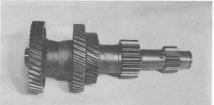 Press drive gear on shaft with long hub of gear away from