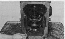 case bore. Figure 114 - Shows one bearing with all rollers held in place with a rubber band.