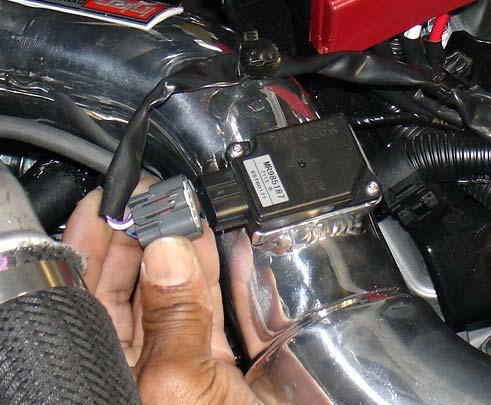 Figure 51 An allen wrench is used to tighten the bolts