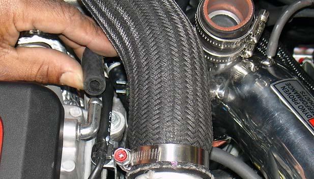 (A) (B) Figure 56 Align the lower 4mm hose over the