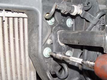 Figure 6 Step 7: Remove all four T45 Torx bolts fastening each bumper shock to the radiator support, eight total.