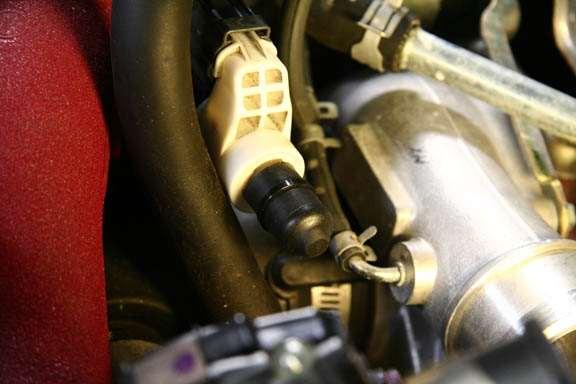 Install rubber cap over the open end of the white electronic check valve