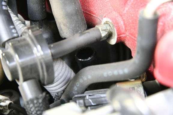 Remove OEM engine breather return hose from the turbo inlet