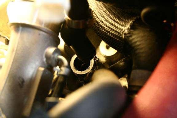 11. Unplug the plastic Y from the crank case breather.