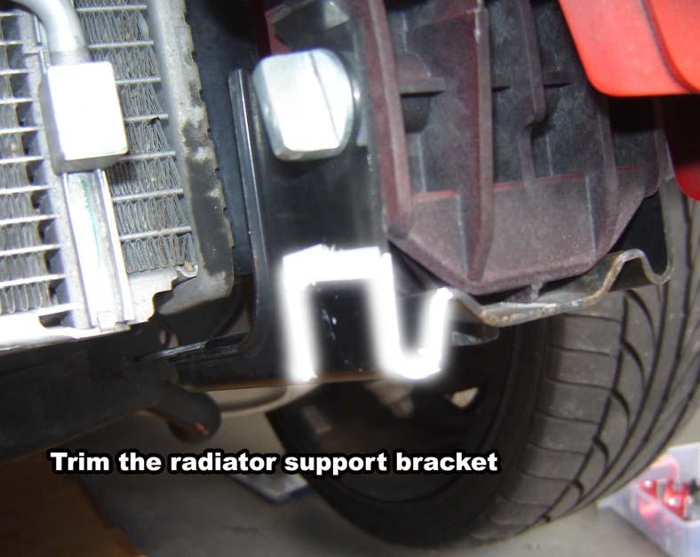 ONLY REMOVE ONE BRACKET AT A TIME TO AVOID RADIATOR