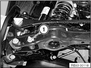 Original Suspension Removal While supporting lower control arm in the compressed position (loaded