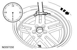 Lubricate the valve stem with soapy water and install the valve stem and TPMS sensor assembly into the wheel using a block of wood and a suitable valve stem installer. 3.
