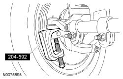 3. Remove the outer tie-rod end cotter pin, retainer and nut. Discard the cotter pin. To install, tighten to 103 Nm (76 lb-ft). 4. Using the Ball Joint Separator, disconnect the outer tie-rod end. 5.