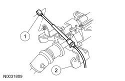 Disconnect the selector lever cable from the steering column. 1. Disconnect the selector lever cable from the steering column shift tube lever. 2.