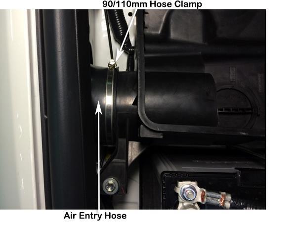 Fasten with the original mounting hardware. Loosely install a 90/110mm hose clamp (item 12) over the air cleaner inlet.