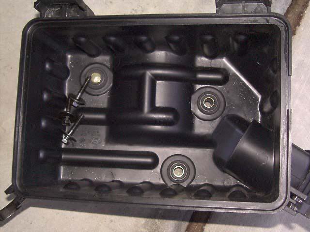 14) Remove bolt holding air cleaner snorkel to side of
