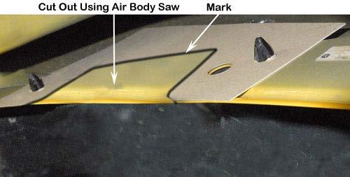 Use a felt tip pen to mark the 3 hole positions and the required fender panel and flare cut out area.