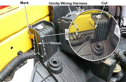 Fasten the snorkel body to the upper mounting bracket with hex bolts (Item 4). 13 Unclip the wiring harness from its mounting position. Mark 80mm down (3.