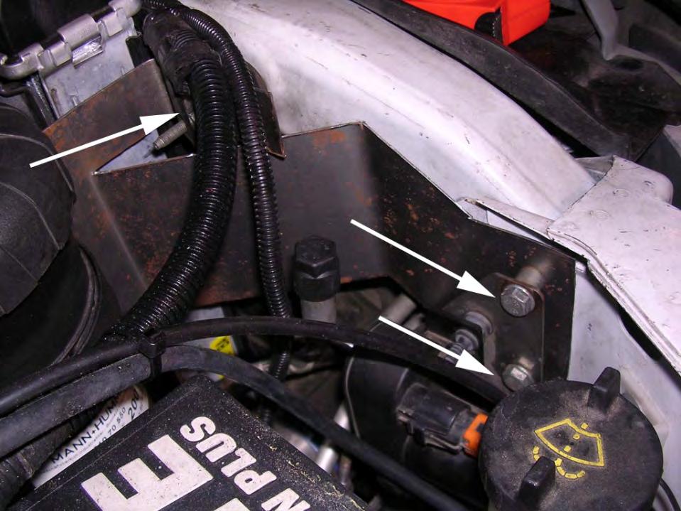 Secure this connection with #32 spring clamp. Route new breather hoses over the radiator shroud.