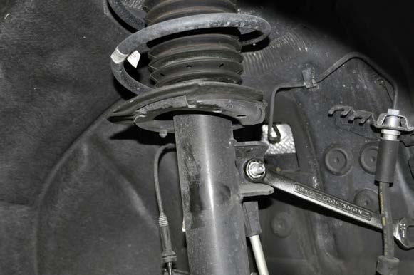 Removal of OEM Front Springs FIGURE 1 FIGURE 3 1.
