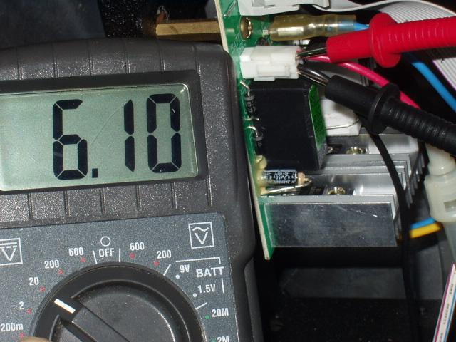 Battery Voltage Test at Drive Board Put multimeter to the DC voltage setting. Put probes on the red and black wire connector on the drive board. Normal reading: 6 VDC.