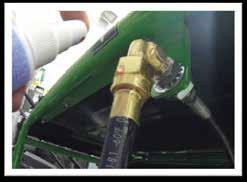 2 If bubbles appear after the leak detector is applied, this indicates a leak in the system. Tighten the fitting until the bubbles dissipate and recheck the system.