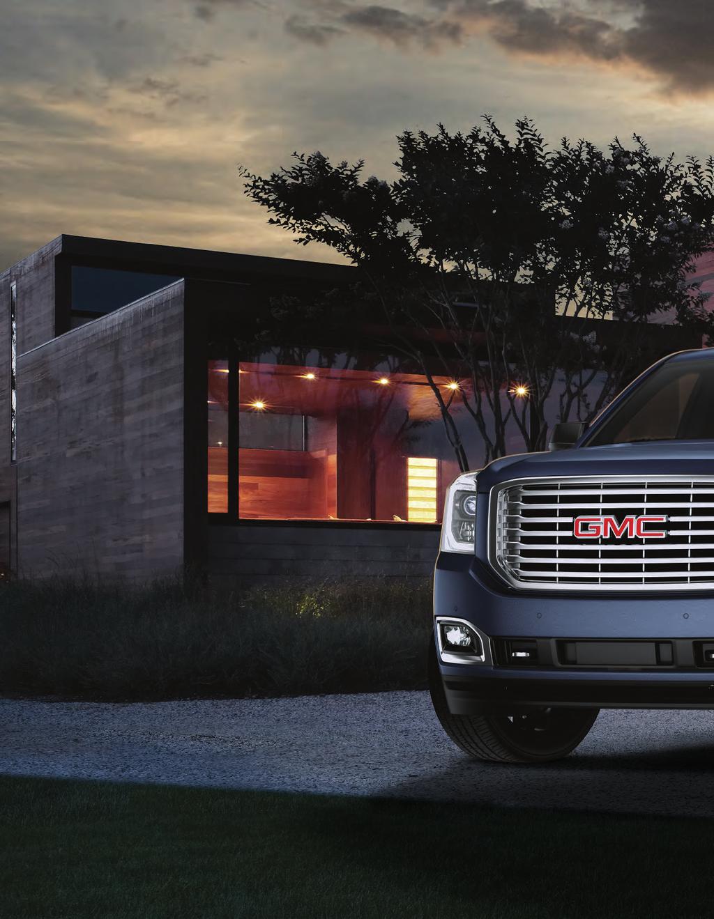 2018 YUKON 2018 Yukon SLE shown with these available accessories: Chrome Grille, Chrome Recovery Hooks, Gloss Black Mirror Caps,