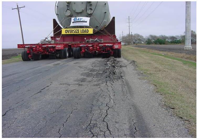 11 Figure 2.3: Pavement Damage to Farm to Market Road 796 in Texas (Oh and Wimsatt 2010) Adams et al.