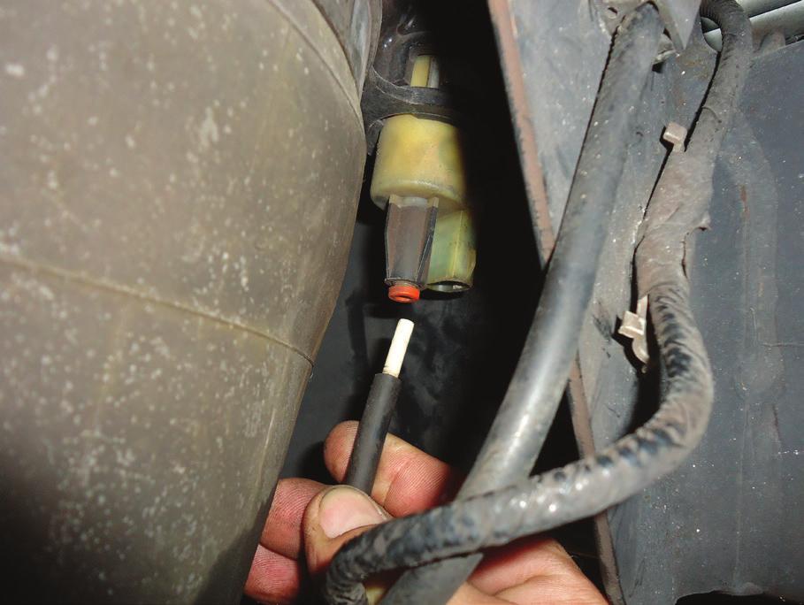 REMOVE THE AIR LINE FROM THE AIR SPRINGS SOLENOID.