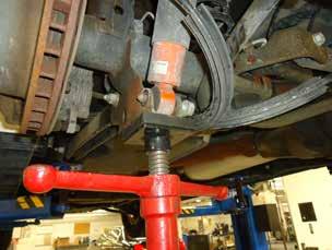 Support the axle to relieve pressure from the