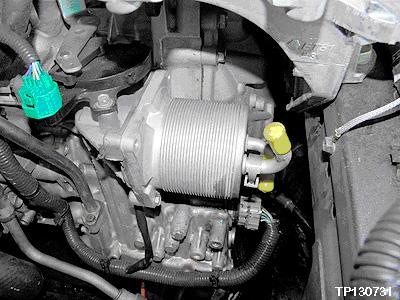 9. Remove both of the CVT Fluid Cooler coolant hose (Water Hose B and Water Hose C) spring clamps and then remove both of