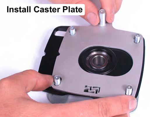 Place the passenger side Caster Plate on top of the passenger side Bearing Plate, making sure that the raised lip