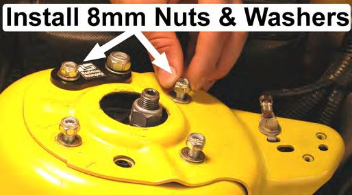 Be careful to orient the notches on the MM Caster/ Camber Plate towards the outboard side of the vehicle.