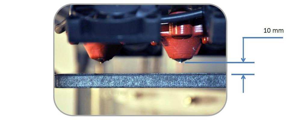 The print bed is mounted on three sprung bolts which allow adjustment of the bed height in three places.