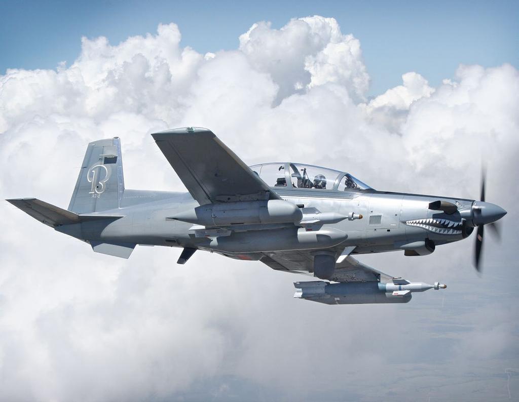 AT-6 Visit or contact a defense company sales rep: +1.316.676.0800 Images may show optional equipment. 2013 Beechcraft Defense Company LLC. All rights reserved.