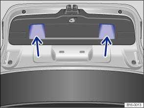 Lift the luggage compartment lid slightly at the button fig. 28 (arrow). The luggage compartment lid opens automatically.
