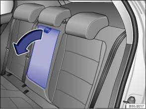 Fig. 42 Folding down the rear center armrest. Please first read and note the introductory information and heed the WARNINGS.