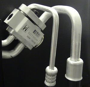 Air Conditioning Figure 11-7 3. Torque the 6mm clamping bolt holding the hoses on the expansion valve to 7 ft/lbs. Figure 11-8 4.