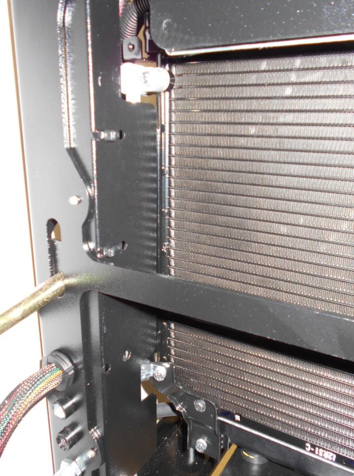Air Conditioning Figure 11-22 8. The back and side panels must be removed to attach hose. 9.