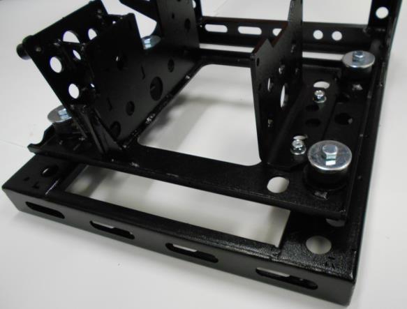 the Plate. Figure 4-3 Right Engine Mount Plate is shown here. Short side mount holes align with the Main Engine Mount Plate holes then Rubber Mount Assemblies are installed.
