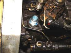 Remove the original factory fuel supply line at the fuel inlet port on the injector pump. Figure 12 Figure 13 5A-2.