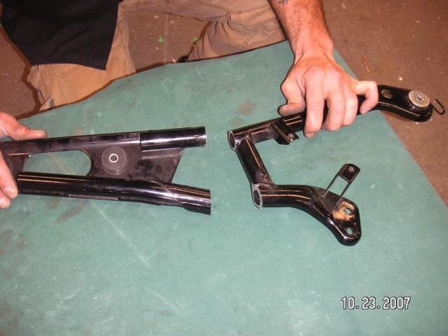 Cut exhaust support as shown above. Discard part on left.