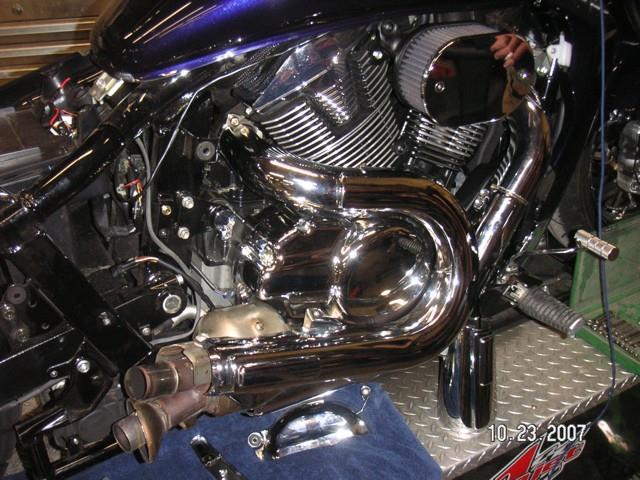 Reinstall nuts / studs from manifold to engine, front and
