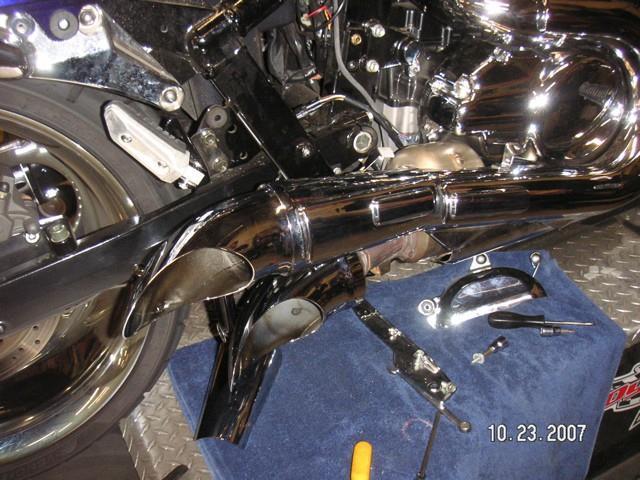 Slip upper tube and heat shield onto upper manifold. You will need to twist and adjust the inner tube, heat shield and Scorpion tip as a loose assembly to get the desired angle you want for the tips.