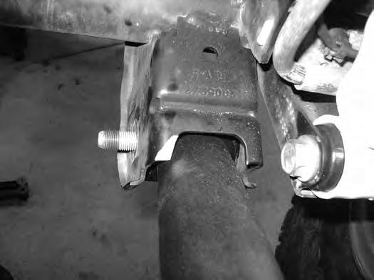 Using a grinder, remove the material from the control arm mounts as shown for control arm clearance. (Figures 7a, 7b). FIG. 7A DRIVERS SIDE SHOWN FIG.