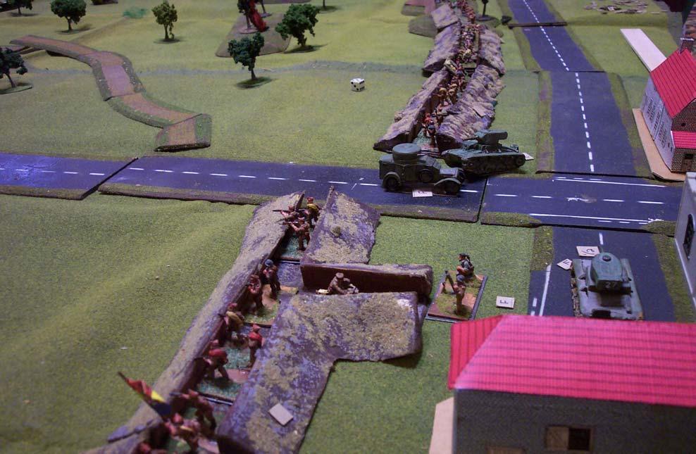 The CTV attack races down the Caratarra under enemy artillery fire. The flame thrower unit is shown behind the lead to CV33 companies.